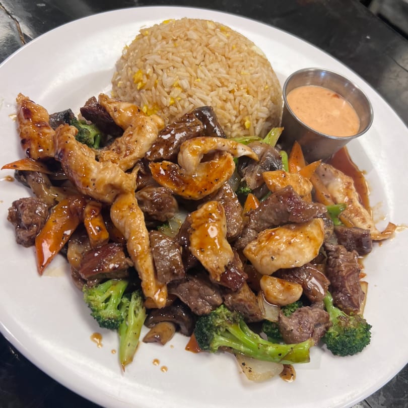 Seafood Palace's chicken, beef, and shrimp stir-fry with broccoli, mushrooms, and fried rice.